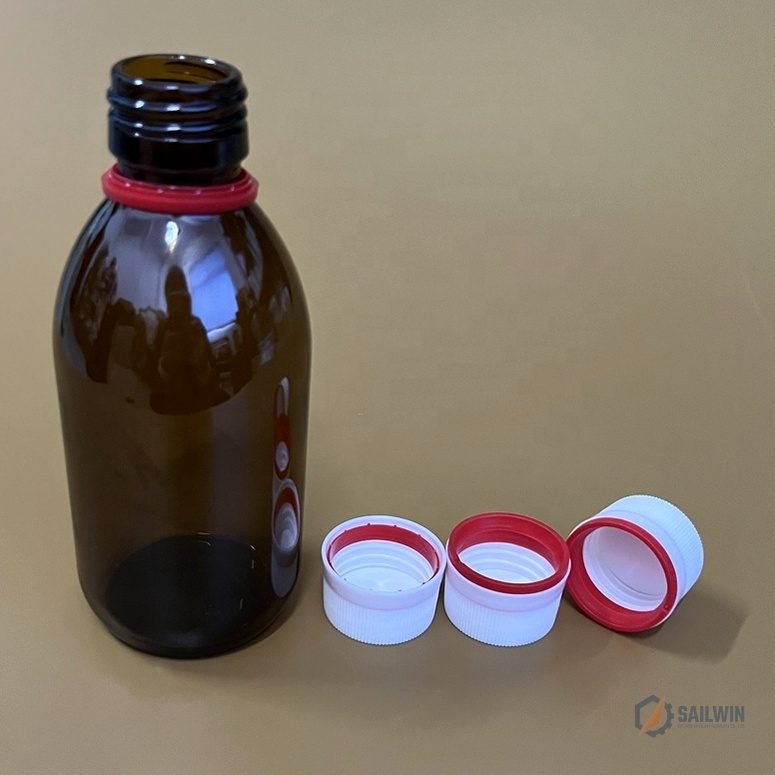 Amber liquid syrup bottle with dual-color safety cap assembly and tamper-evident collar Sailwin