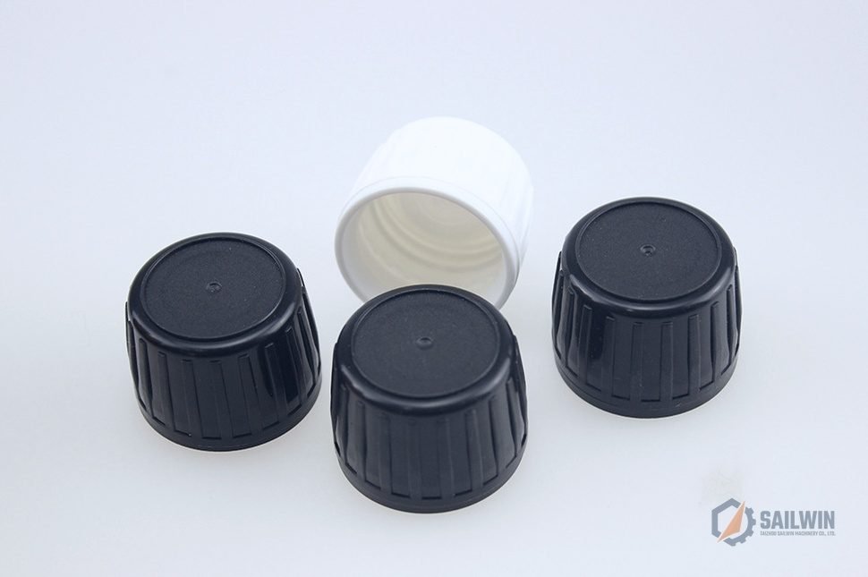 Black and white pharmaceutical screw caps with ribbed knurling and tamper-evident seal Sailwin