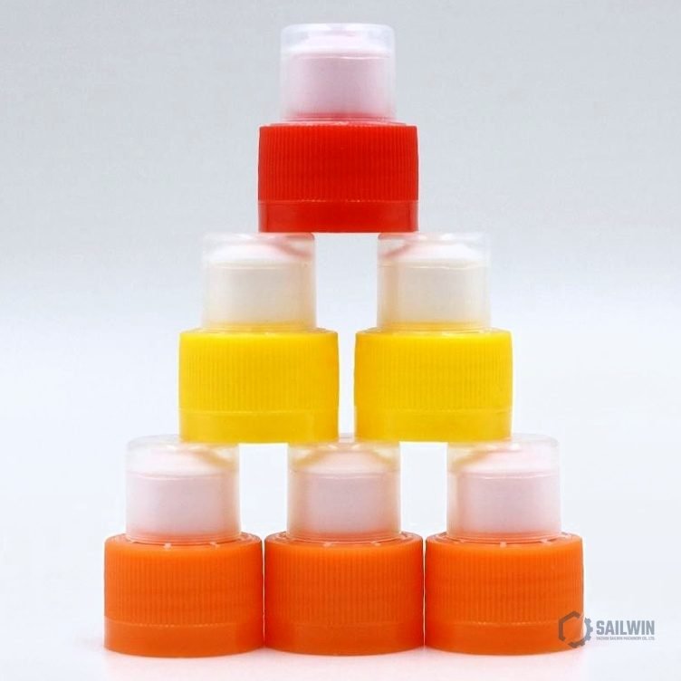 Colorful sports drink push-pull spout caps on display table Sailwin
