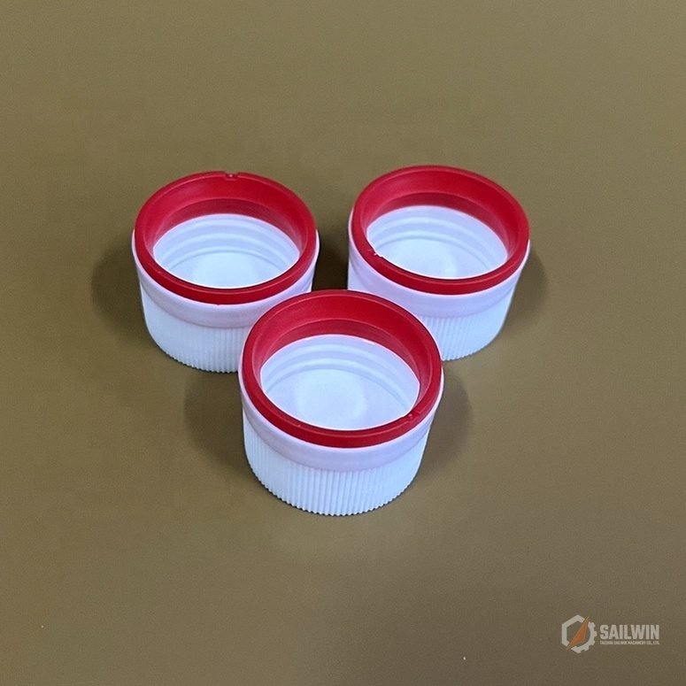 Interior view of dual-color medical caps showing internal seal thread and locking ring Sailwin
