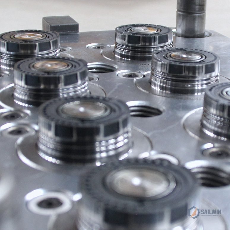 Perspective view of 8-cavity oil cap mold core plate with heavy guide pins and stripping ring Sailwin