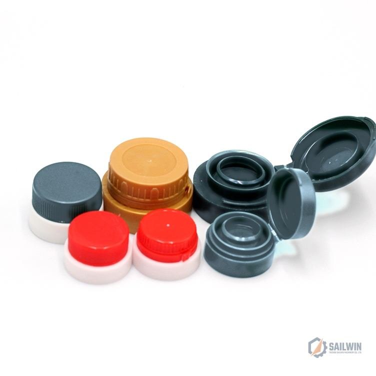 Push-pull cap mold cavity plate with cooling lines in workshop with blue floor Sailwin