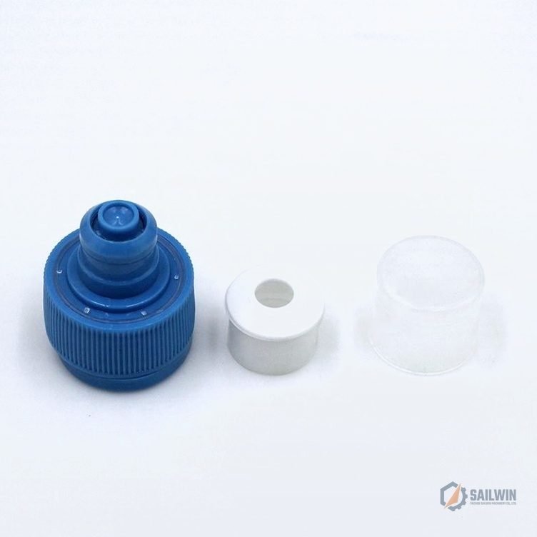 Red and white push-pull dishwashing liquid bottle closures on studio background Sailwin