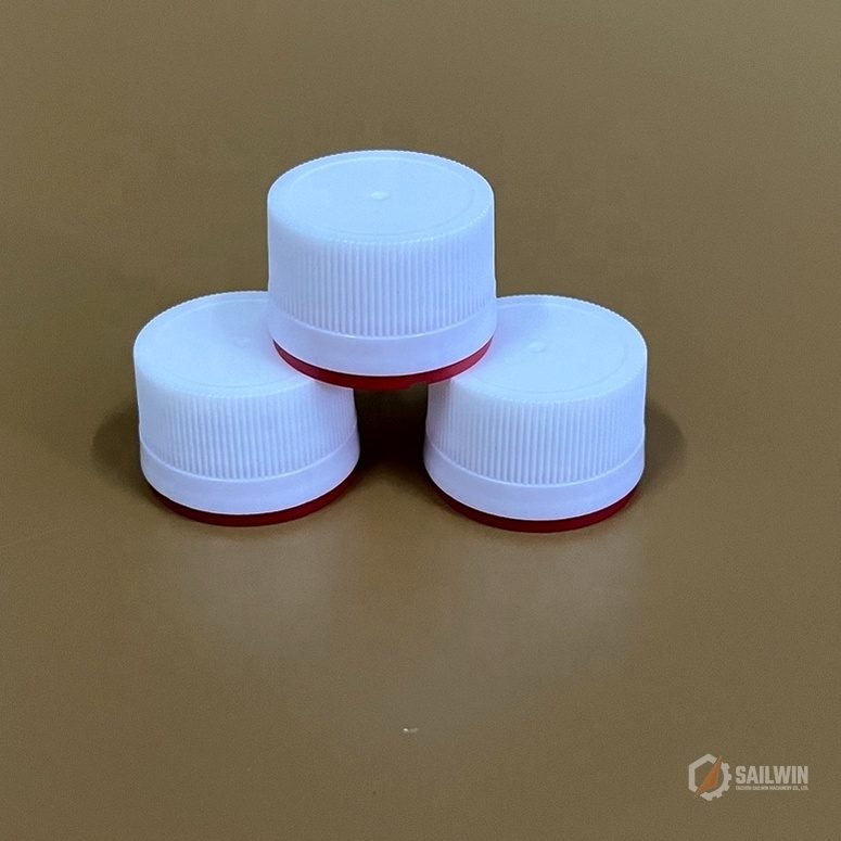 Stack of dual-color tamper-evident pharmaceutical closures with ribbed grip Sailwin