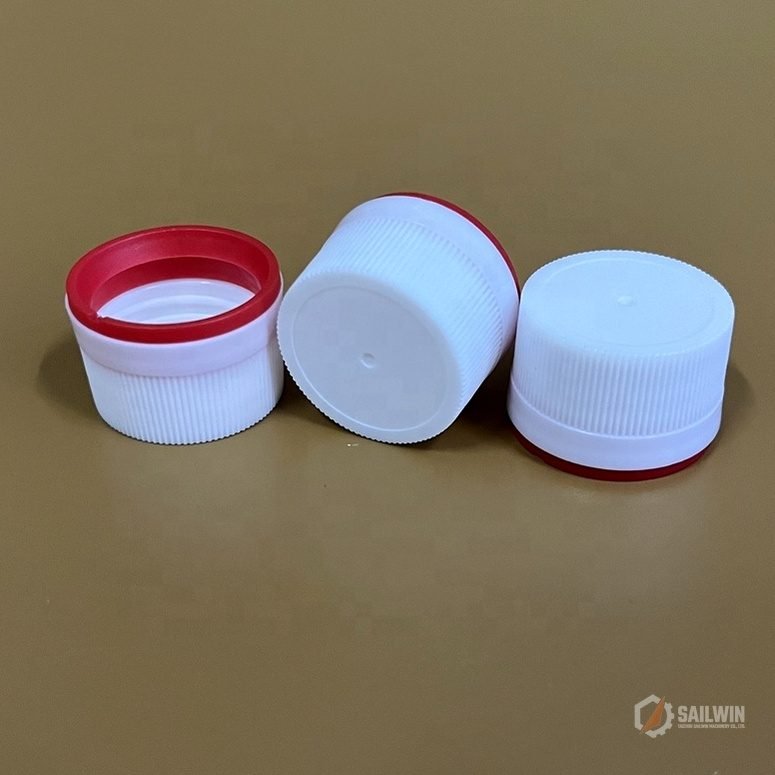 Three white medical caps with red tear-off locking collar on studio background Sailwin